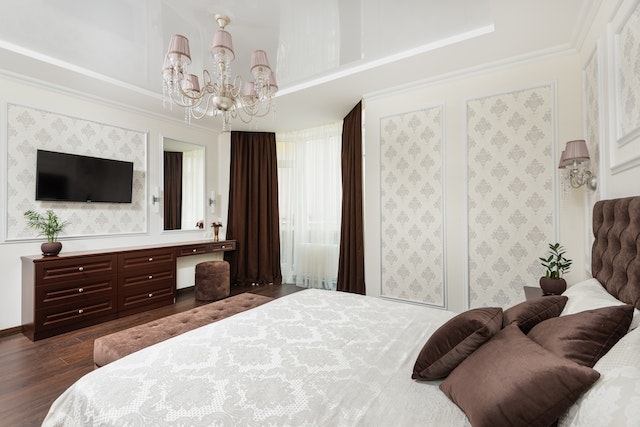brown-throw-pillows-on-white-bed